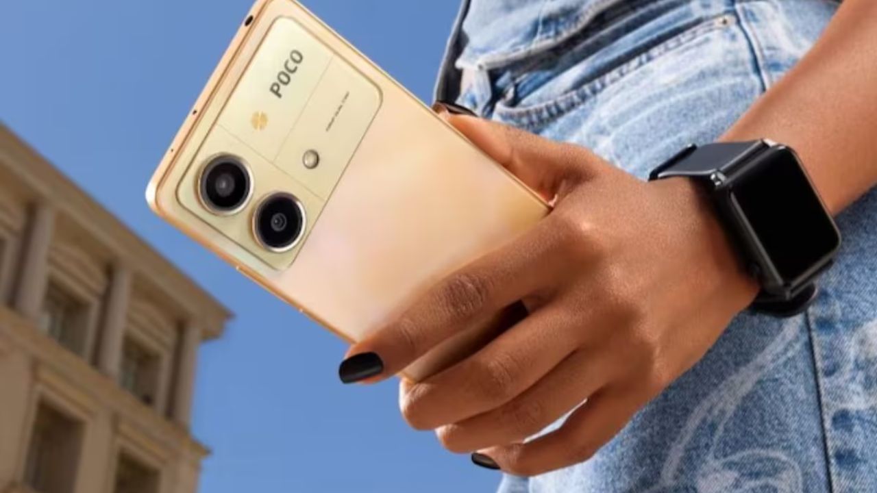 Poco x6 neo in the hand of girl in background of roof and sky