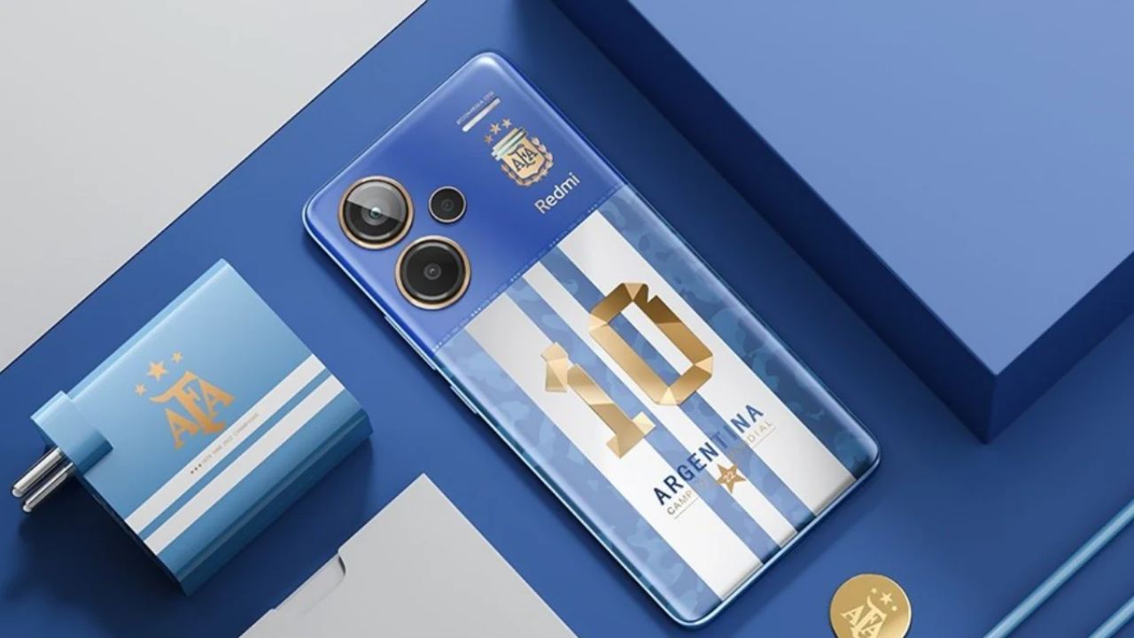 Redmi Note 13 Pro+ World Champions Edition in blue color with charger and back look of phone on blue table