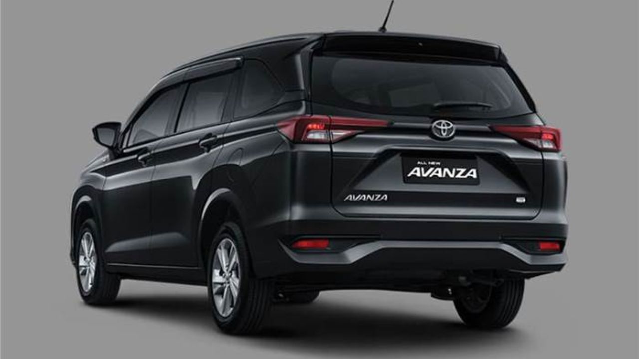 Toyota Avanza in black color in plain grey background