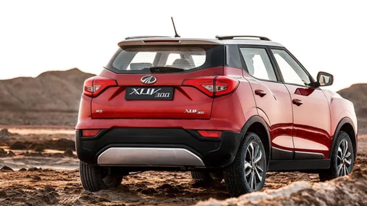 Mahindra XUV 300 in red color infront of brown mountains or hill