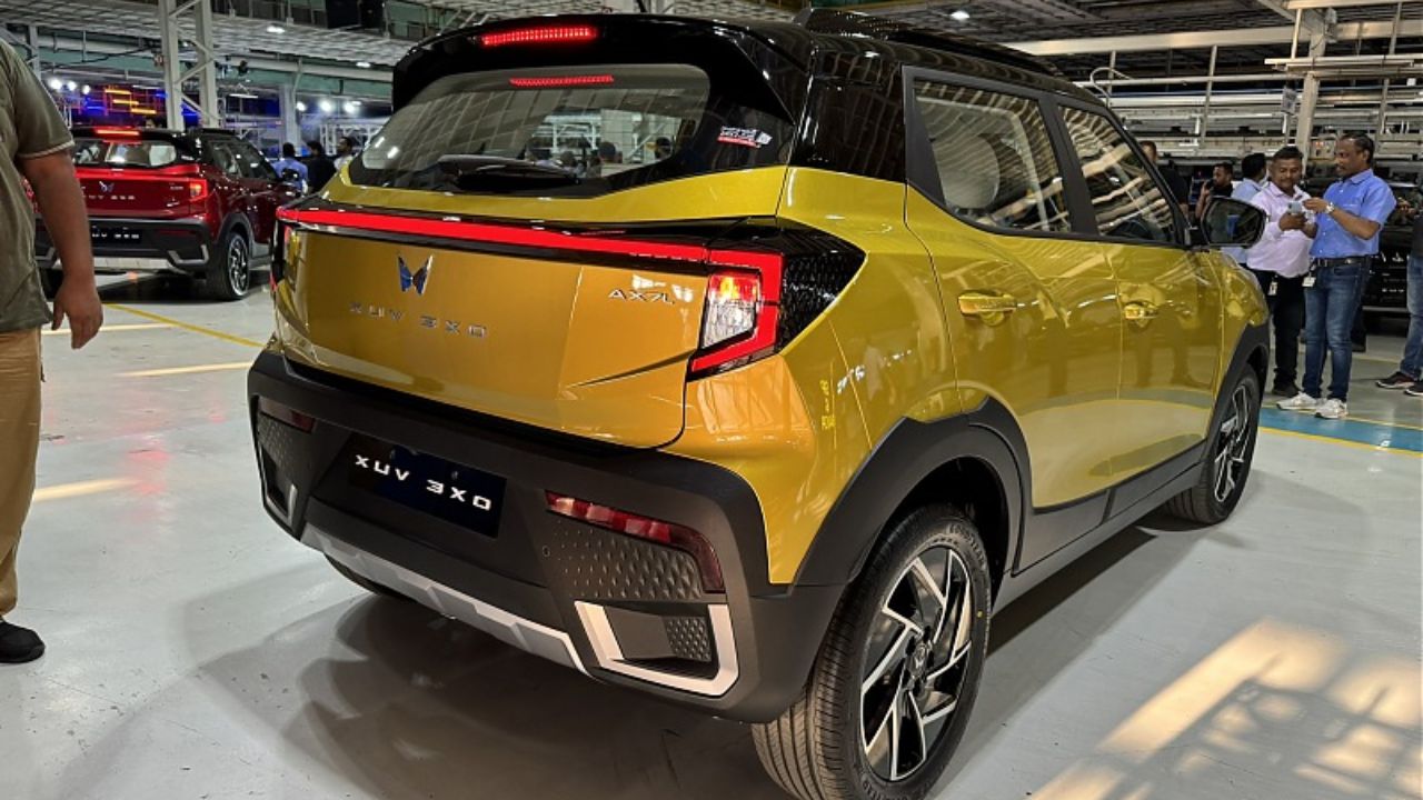 Mahindra XUV 3X0 in yellow color in showroom