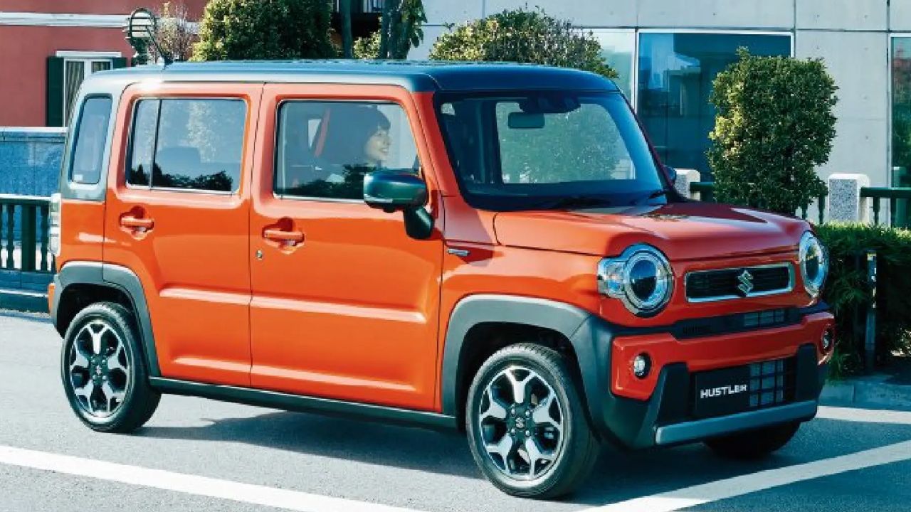 Maruti Suzuki Hustler in range and black color on road