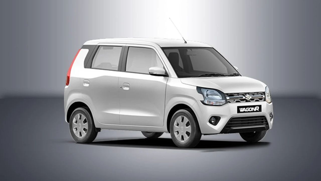 Maruti Suzuki WagonR in white color infront of plain white and grey background