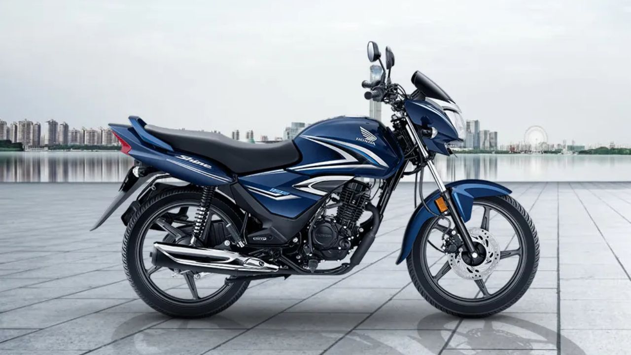 New Honda Shine in blue color on road infront of big buildings