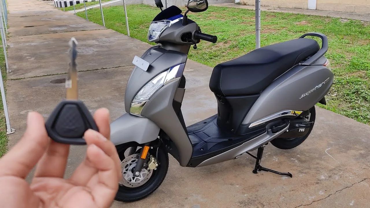 TVS Jupiterin grey and black color on road