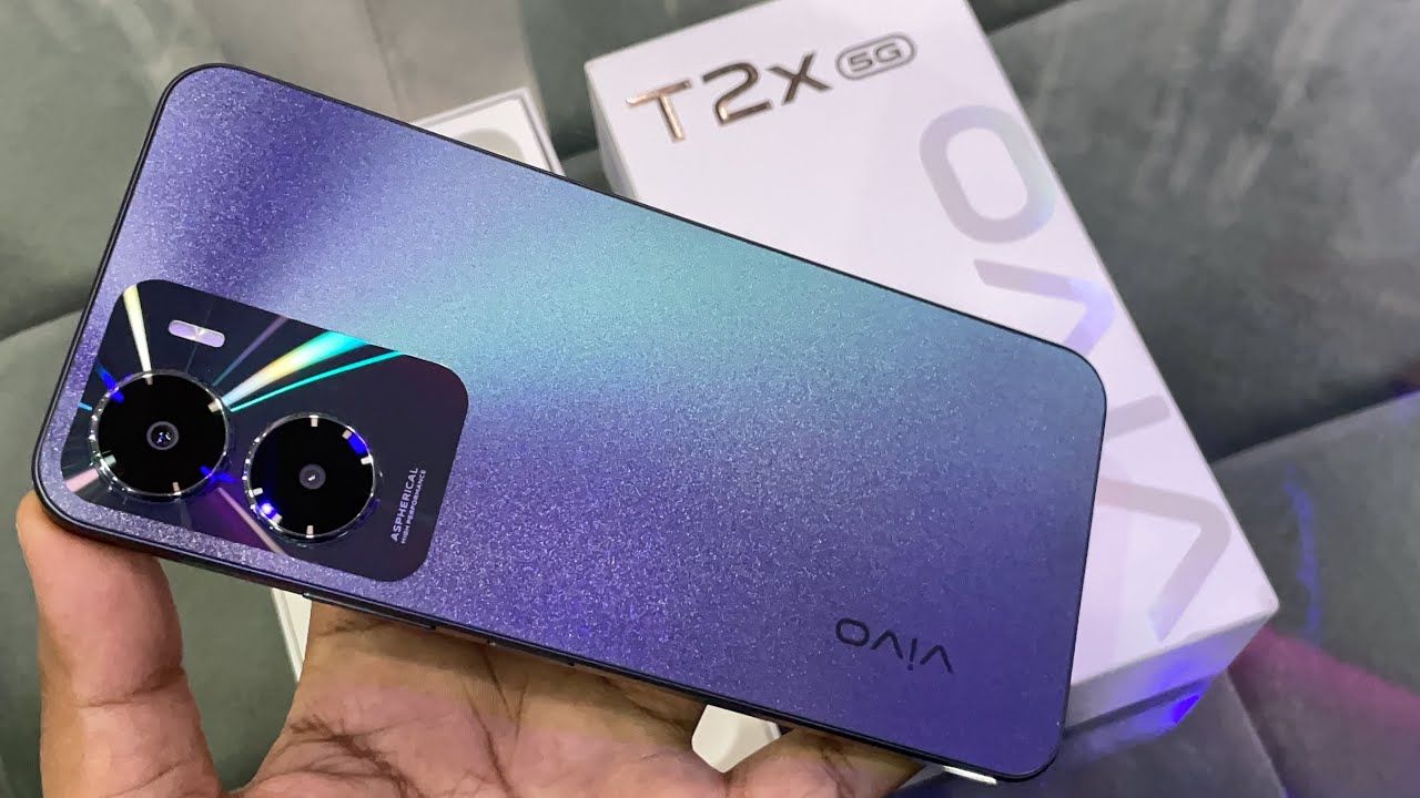 Vivo T2x 5G in blue color in hand infront box