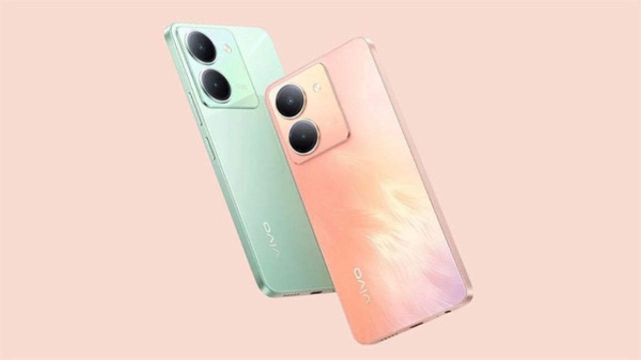 Vivo Y78m in light pink and mint green color infront of light pink color background