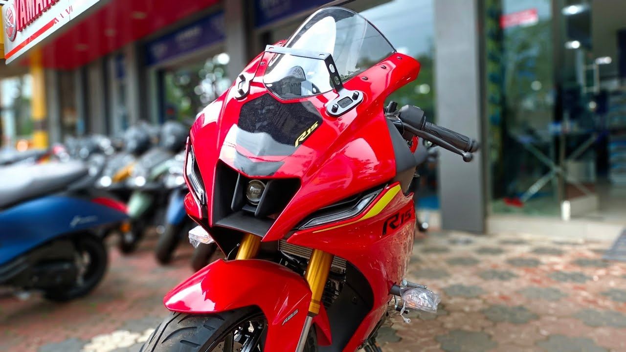 Yamaha R15 in red color outside the showroom near many bikes