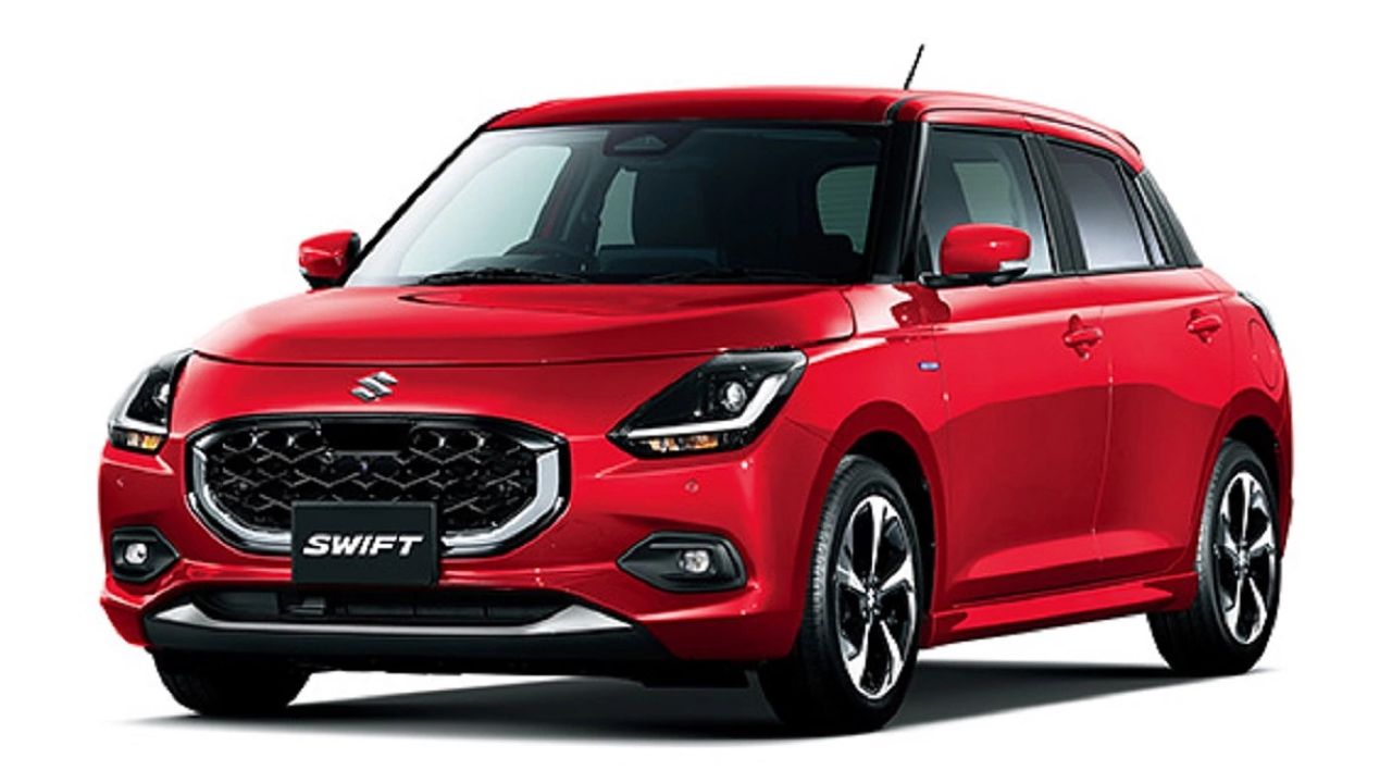 new maruti swift IN RED AND BLACK COLOR INFRONT OF PLAIN WHITE BACKGROUND