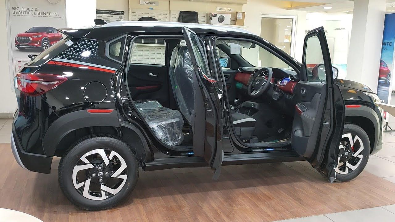 nissan magnite in black color in showroom